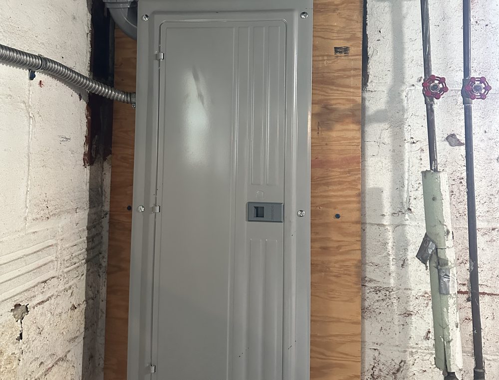 New breaker panel installed in a basement by DEC Electric